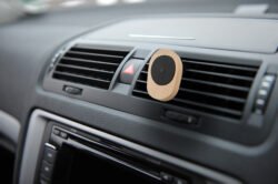 controls near the steering wheel in a modern car uchwyt na telefon do samochodu