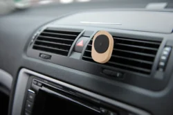 controls near the steering wheel in a modern car uchwyt na telefon do samochodu
